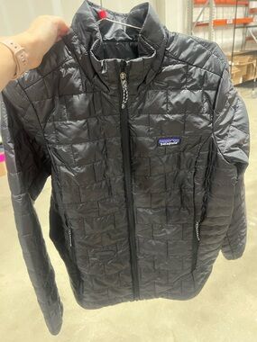 Womens Patagonia Black Quilted Jacket with Contrasting White Embroidery. Large.